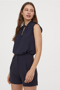 Blouse à col plissé